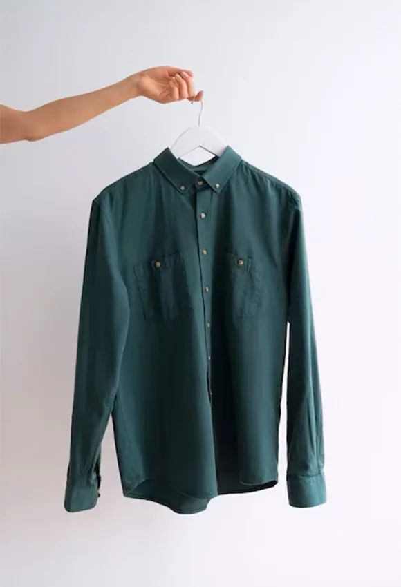 Green shirt in a hanger