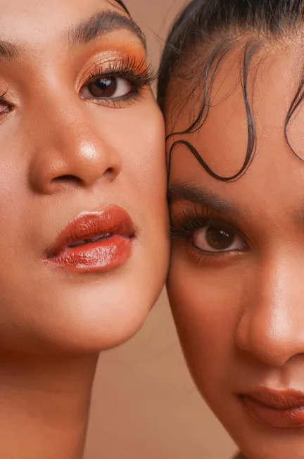 2 women with makeup