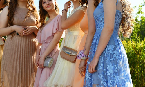 Women wearing knee length gowns