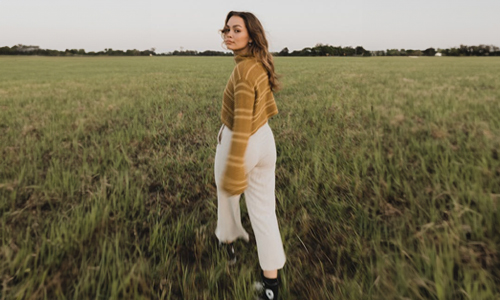 Woman walking in field