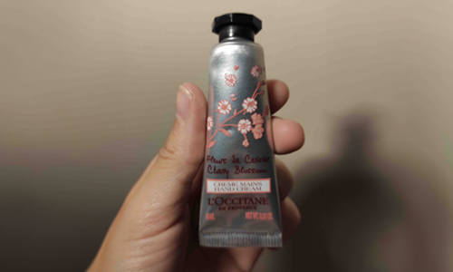 Person holding hand cream