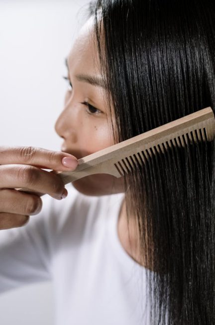 Woman-combing-her-hair