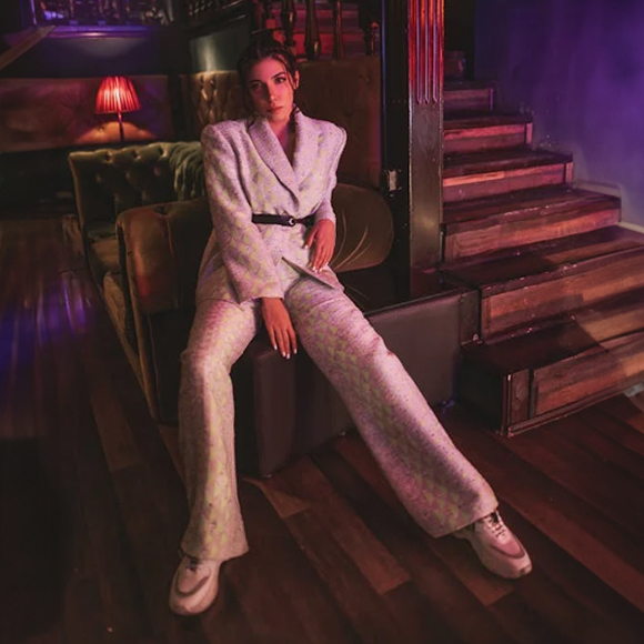 Women in white suit
